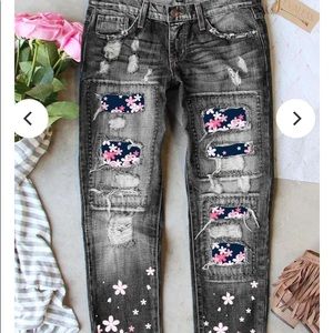 Black jeans, cherry Blossom design. Ripped style